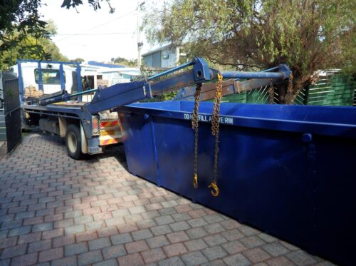 Truck Delivering A Empty Waste Skip—Scrap Metal Recycling in Sunshine Coast, QLD